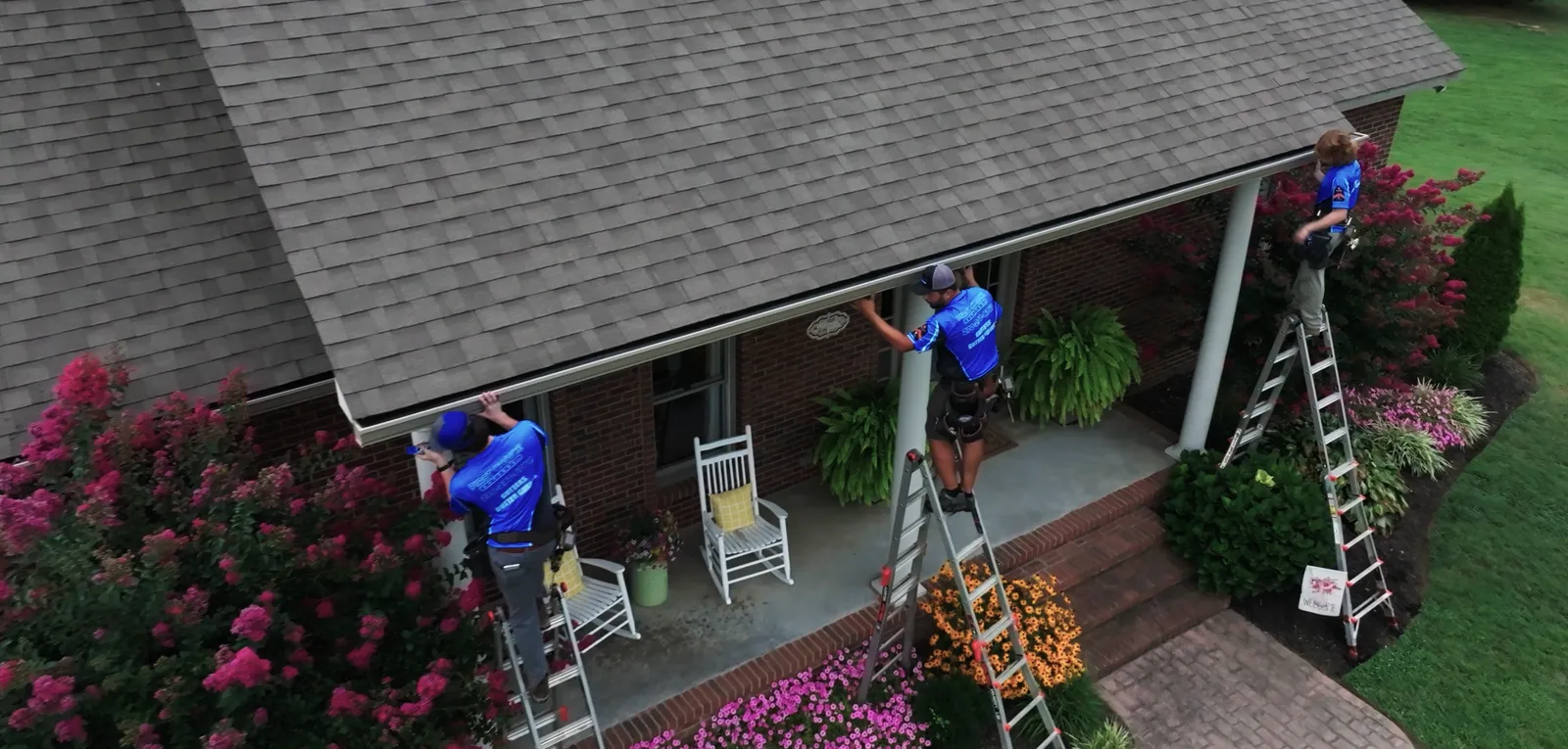 Seamless gutter installation on a residential home